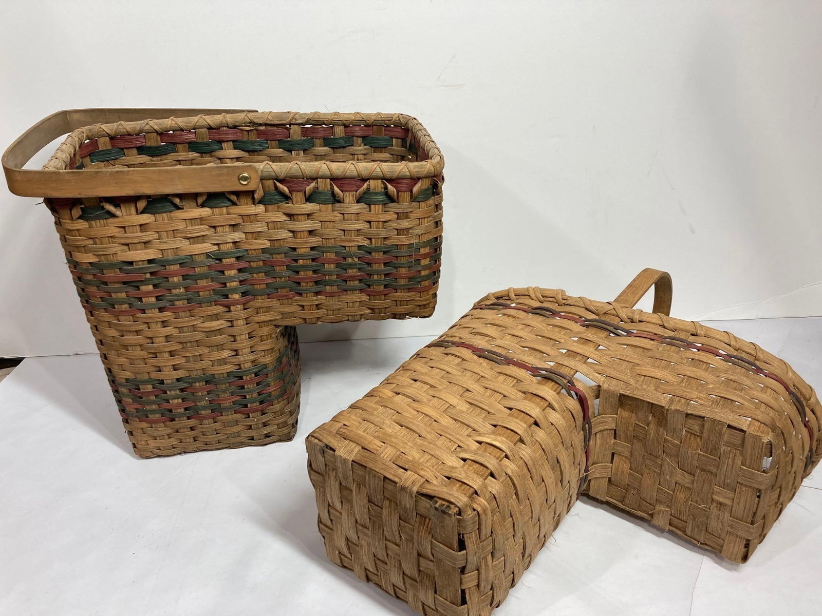 PAIR OF HAND WOVEN STEP BASKETS: EACH IN GOOD CONDITION.