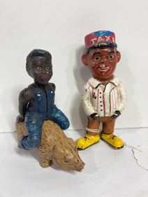 BOY ON PIG AND TAXI DRIVER CAST IRON BANKS