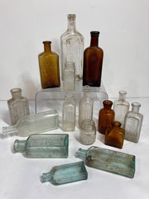 AMBER AND OTHER EMBOSSED EARLY BOTTLES