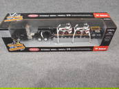 Peterbilt model 579 w/2 bobcat ss76 skid steer loaders on flatbed trailer