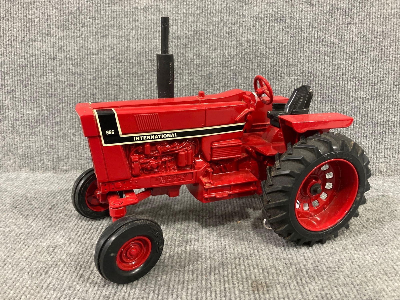 ERTL INTERNATIONAL 966 BLACK STRIPE WF TRACTOR: OUT OF BOX SHOWING APPROPRIATE WEAR FOR AGE AND PLAY 1/16 SCALE