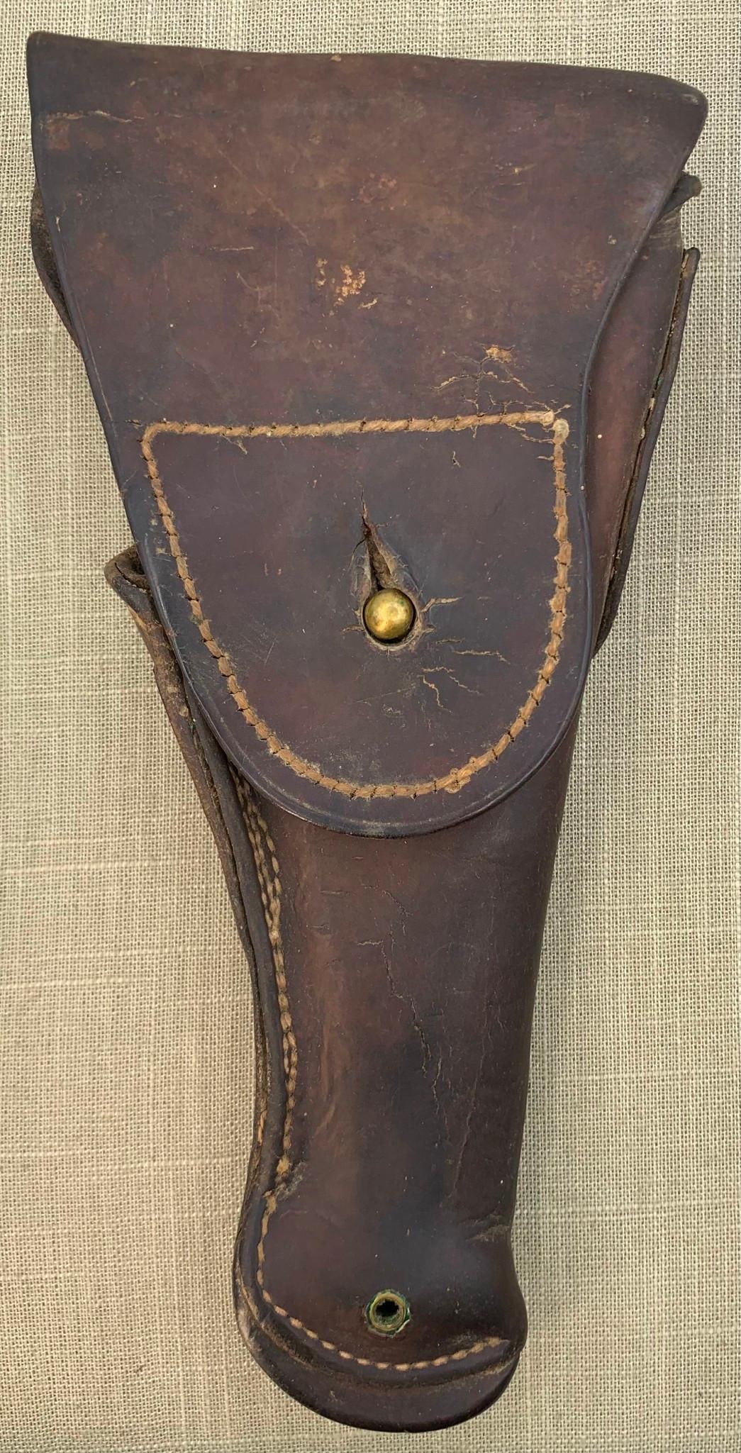 WWI US Army Leather Military Pistol Holster: 10" x 5 1/4" with embossed US stamp, brass trim, great patina to the leather.