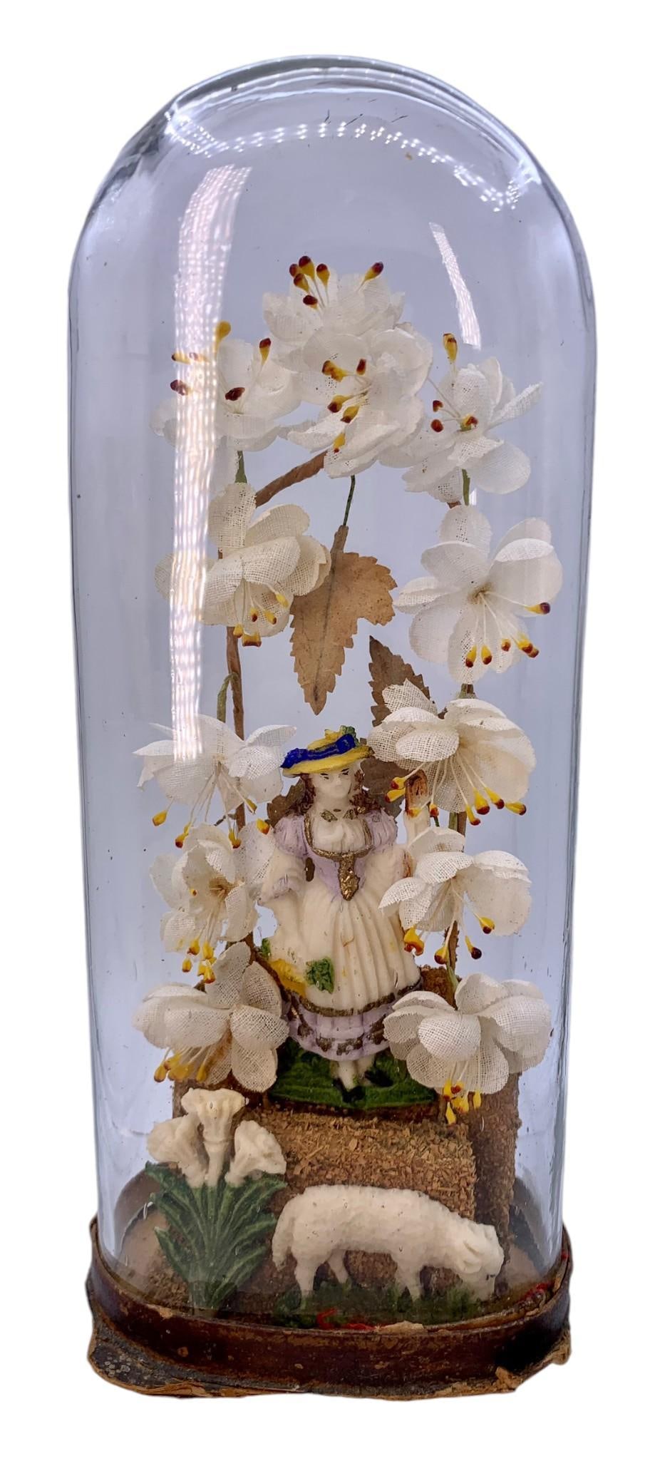 Victorian Glass Cloche Dome Wax Figural Girl with Sheep Floral Vignette: 9" tall, no feet on the paperboard base as shown, glass cloche is good, sawdust/wax/fabric mediums used in the vignette.