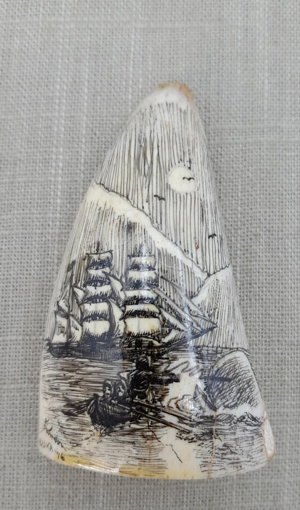 Alaskan Whale Hunt Sailing Ship Scrimshaw Style Inked Natural Material Painted Art: Hand inked On the Surface of the natural material, intricately drawn, signed K Johnson '76 Alaska, 3 1/4" x 2" x 1 1/8".