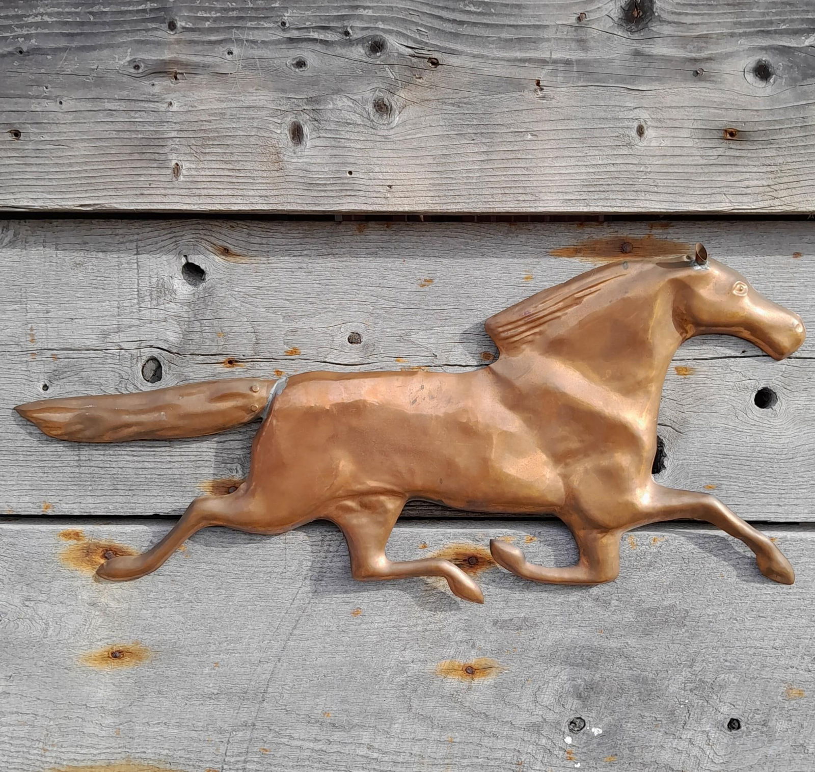 30" Convex Copper Galloping Horse Wall Sculpture: 30" x 12 1/2" x 1 1/2", hanger on rear, structurally sound.