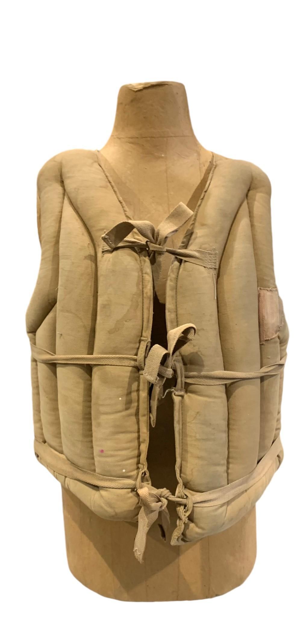 1930s Speedboat US Coast Guard Kapok Adult Size Life Vest: Early fabric with original tag, cotton ties,old patched repairs.