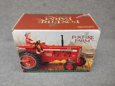 FOXFIRE FARMS MISS CHARLOTT #6 ON A INTERNATIONAL 826 TRACTOR