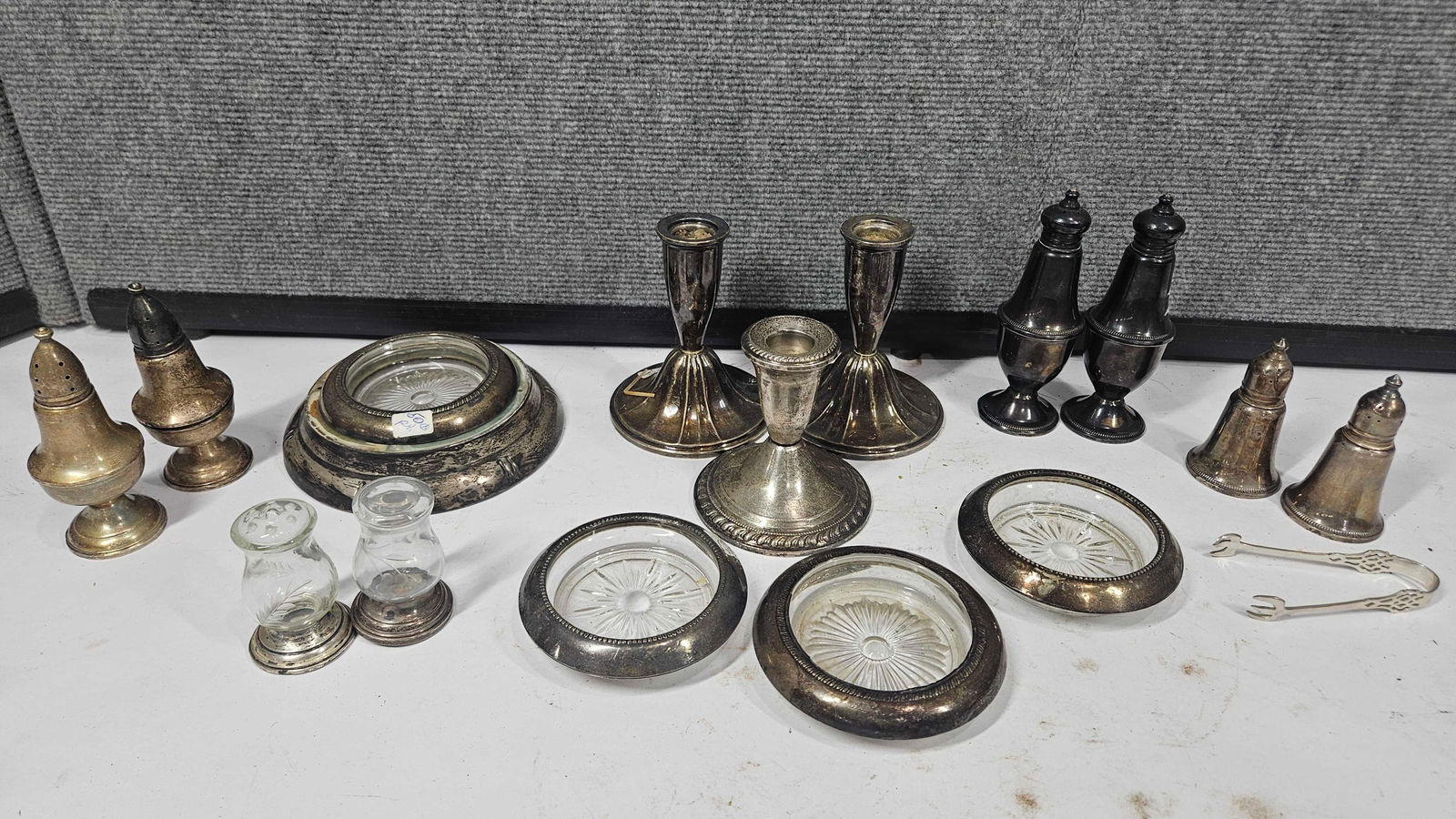 STERLING SILVER CANDLESTICKS, SHAKERS AND MORE: SOME ARE WEIGHTED, BYT ALL PIECES SAY STERLING.