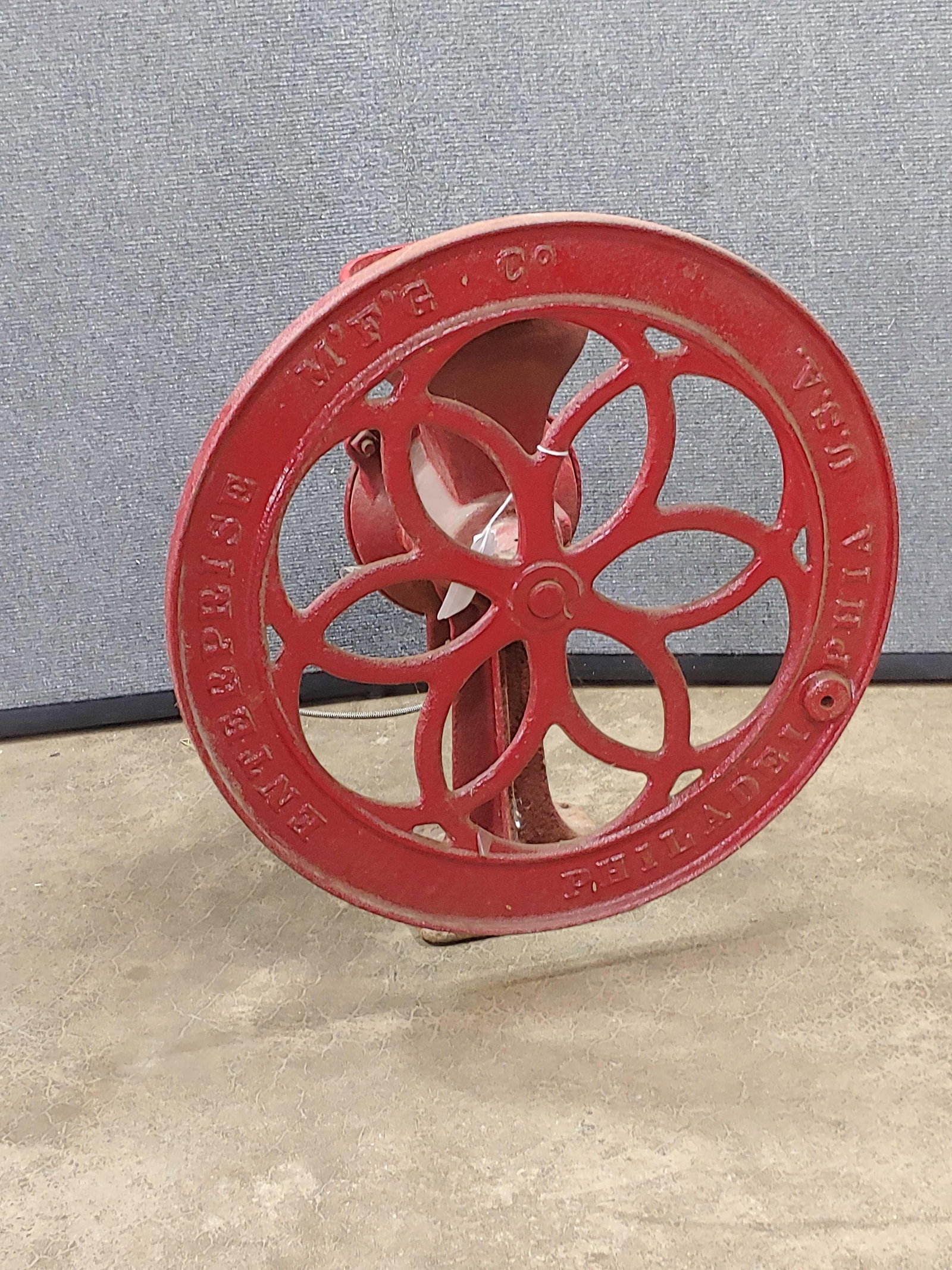 NO 70 ENTERPRISE GRIST MILL: WHEEL DOES TURN BUT IS ROUGH. 21 INCHES TALL, SOME MINOR SURFACE RUSTING.
