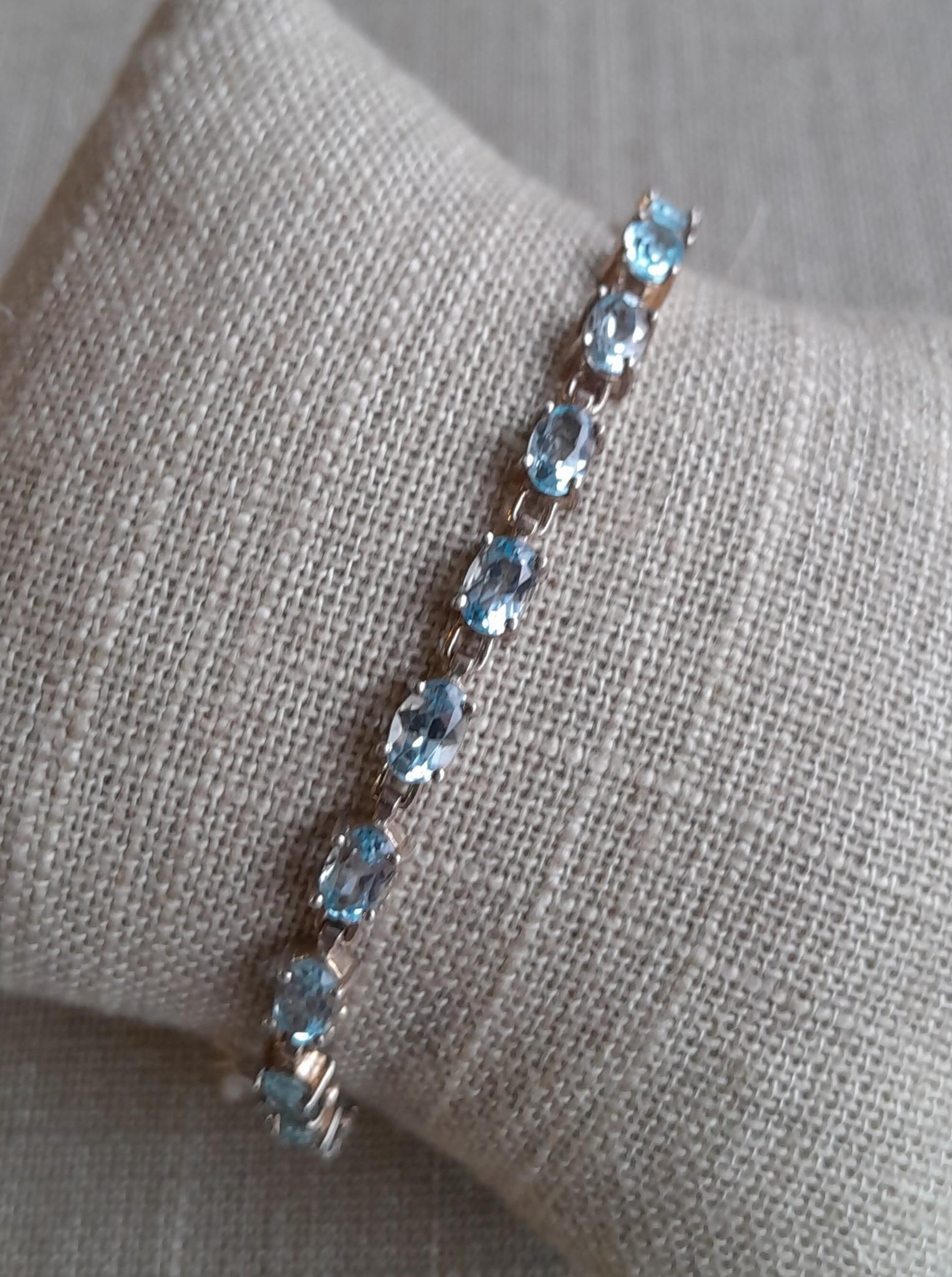 10 Carat Faceted Oval Blue Topaz Gemstone & Sterling Silver Tennis Bracelet (1 of 7)