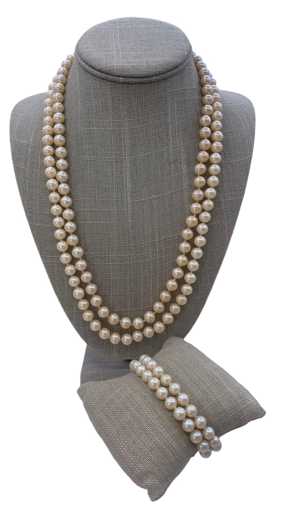 Mid Century New Old Stock TIARA Jewels Double Strand Faux Pearl Necklace & Bracelet, Sterling Clasps: New old stock vintage pieces with Sterling closures, tag remains on the necklace, 22" circumference, hand knotted, 7" wrist circumference.
