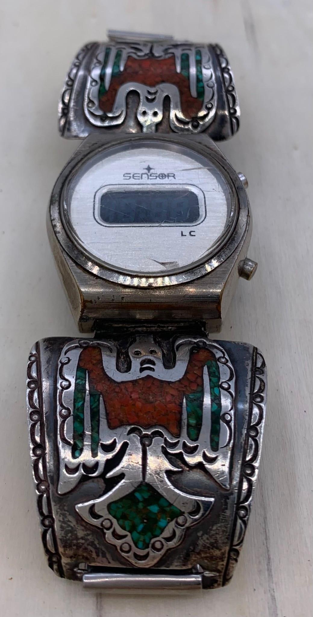 1970s Prince Trading Co. Native American Silver, Turquoise, & Coral Thunderbird Watchband Trim: Found paired with a vintage SENSOR digital watch face and band, stamped with the Prince Trading Co hallmark, each curved and decorated Thunderbird panel is 1 1/2" x 1 1/2", surface tarnish to the Silv
