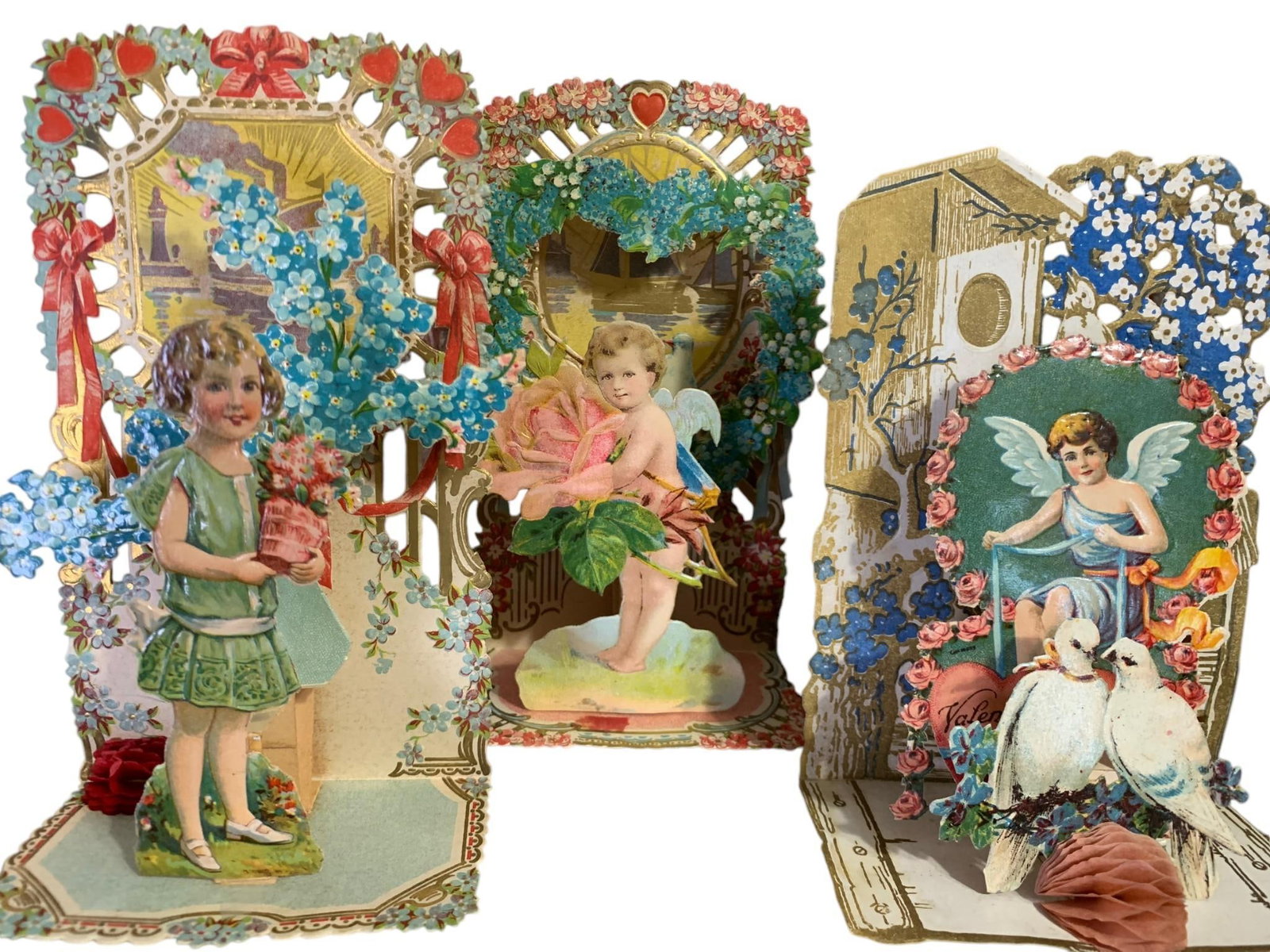 3 Early German Pierced Stand-Up 3-D Honeycomb Valentines: 7' x 5", light age and wear to the paper.