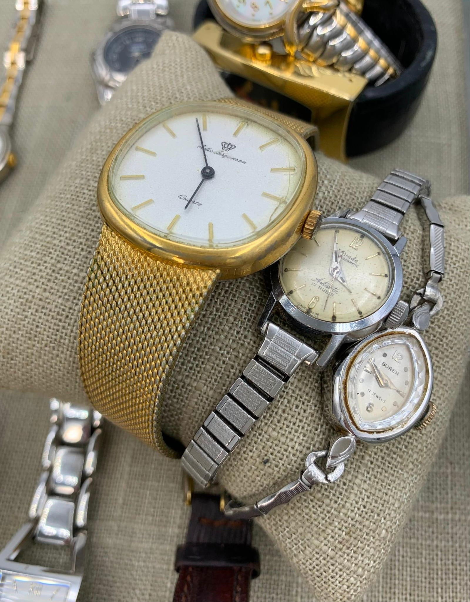 15 Vintage Men's & Ladie's Wristwatches: Wittnauer, Lorus, Elgin Skeleton, Warner Bros., Jules J: Jules Jurgenson, Acuet Japan, Buren 17 jewel, working wind up Swiss Nivada, Lorus Mickey, Pulsar - The Jules J and pulsar quartz have no clasp, the Elgin Skeleton seconds dial works with movement