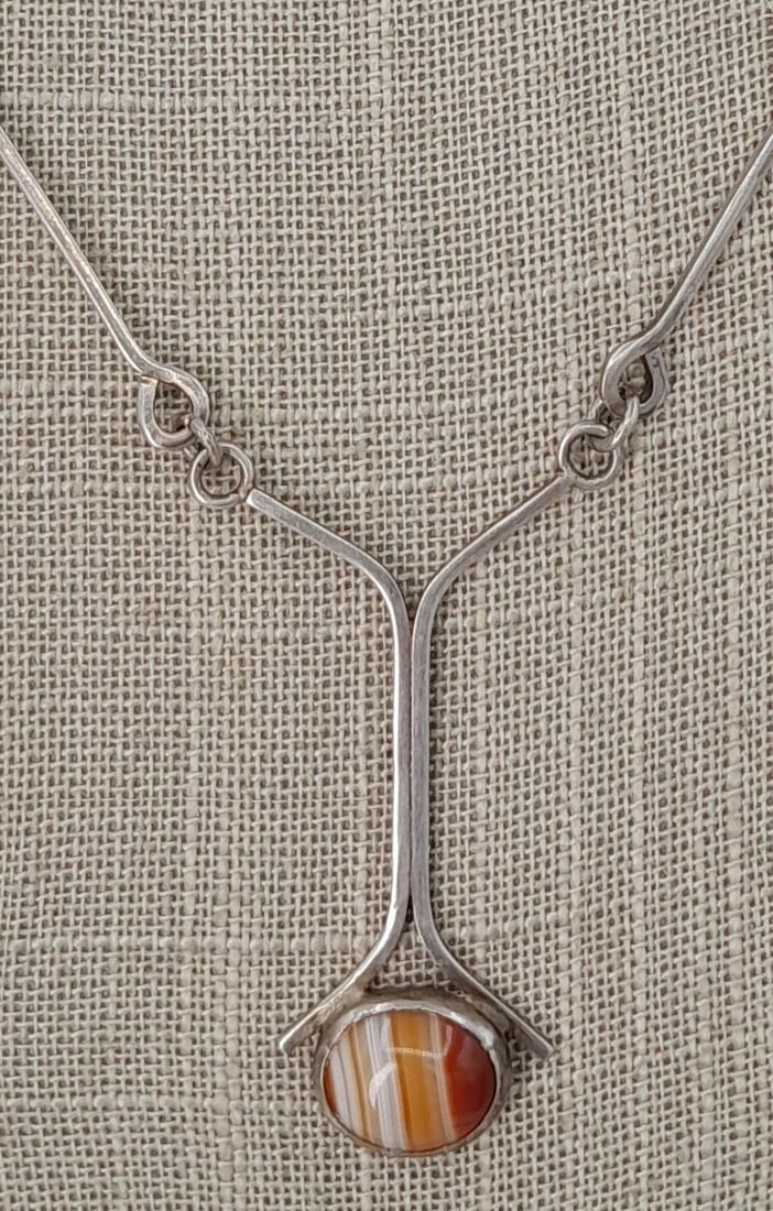 Artisan Made .800 Silver Agate Cabochon Arts & Crafts Bohemian Necklace: 20" circumference, unmarked (tested) .800 silver, 14x10mm agate cabochon, hook clasp.