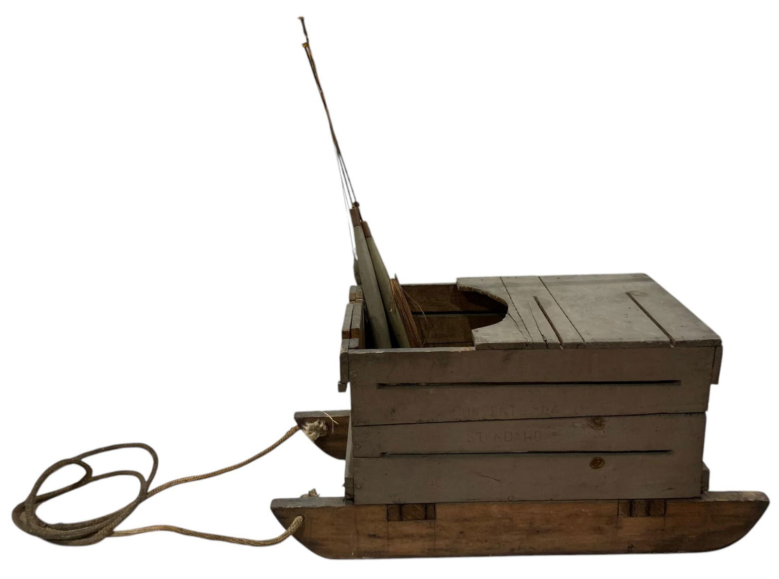 Antique Primitive Wooden Ice Fishing Sled & 2 Early Reels: 23" x 10" 11" sled of wood construction, old rope handle, 22" wood handled metal fishing poles, structurally sound with age and wear.