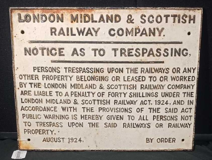 LONDON MIDLAND & SCOTTISH RAILWAY COMPANY CAST IRON PLAQUE: LARGE TRESPASSING SIGN, DATED 1924. 23X18. MINOR RUST DISCOLORATION AROUND EDGES.