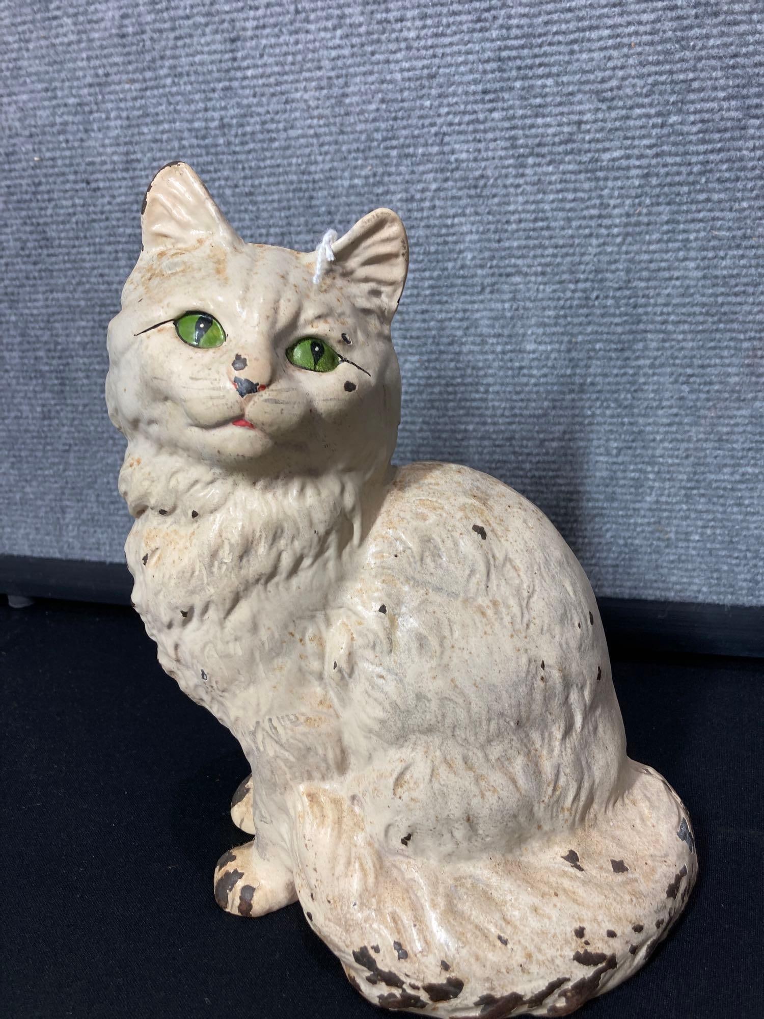 Hubley Cast iron Cat door stop: Minor paint chipping to tail and body. 9 inches tall