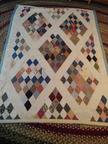 Diamond patchwork knotted comforter