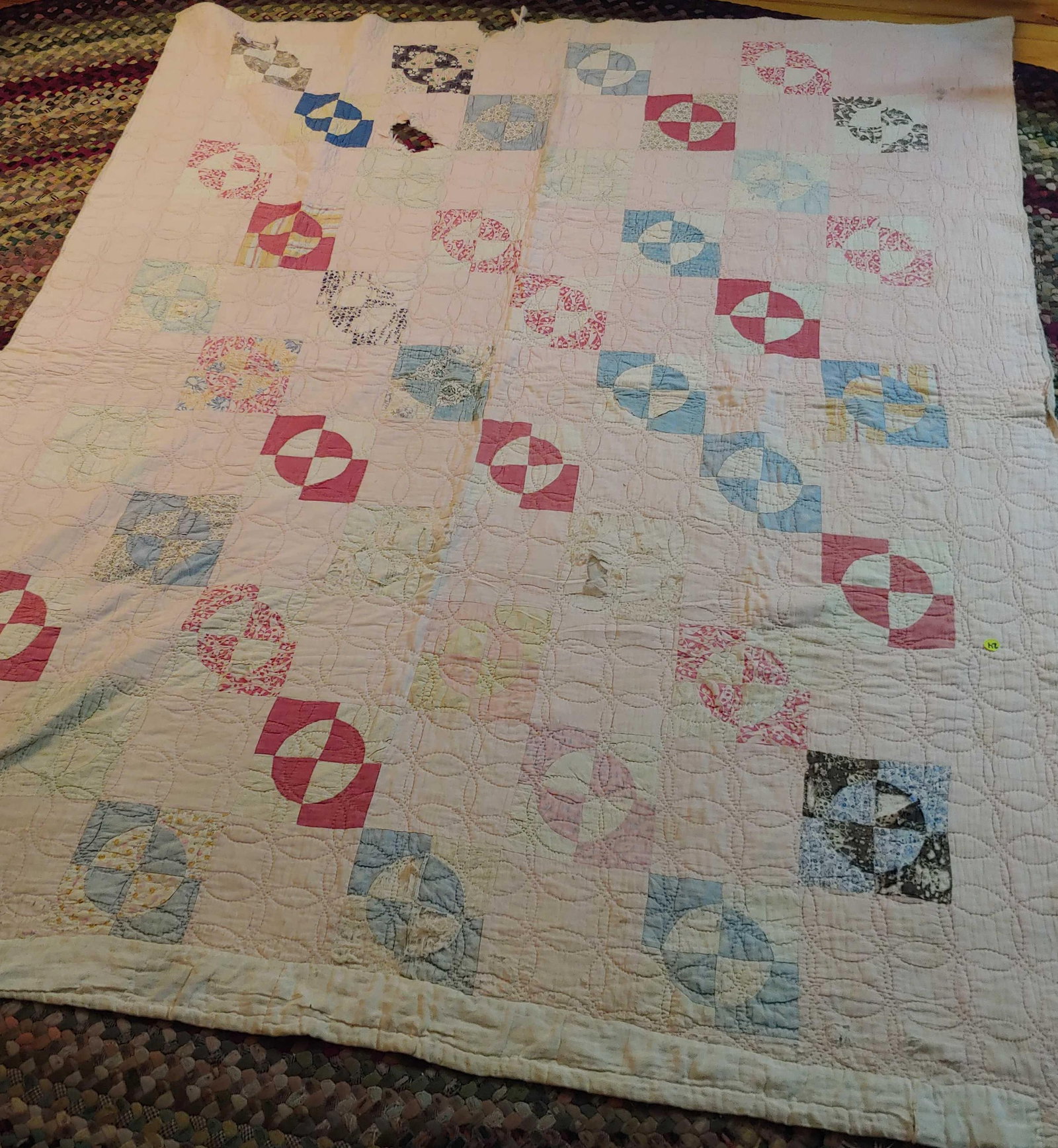 Early quilt: 64in x 83in. With a significant hole and a few tears.