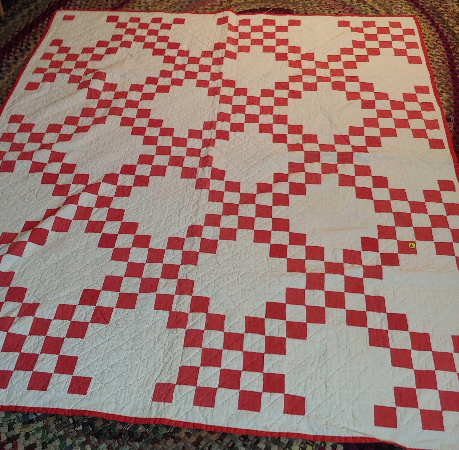 Beautiful Red & White vintage quilt: 66in x 77in. Found 1 small tear in top lining, otherwise is excellent!