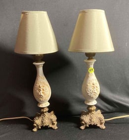 Pair of Cherub and brass ceramic Lamps