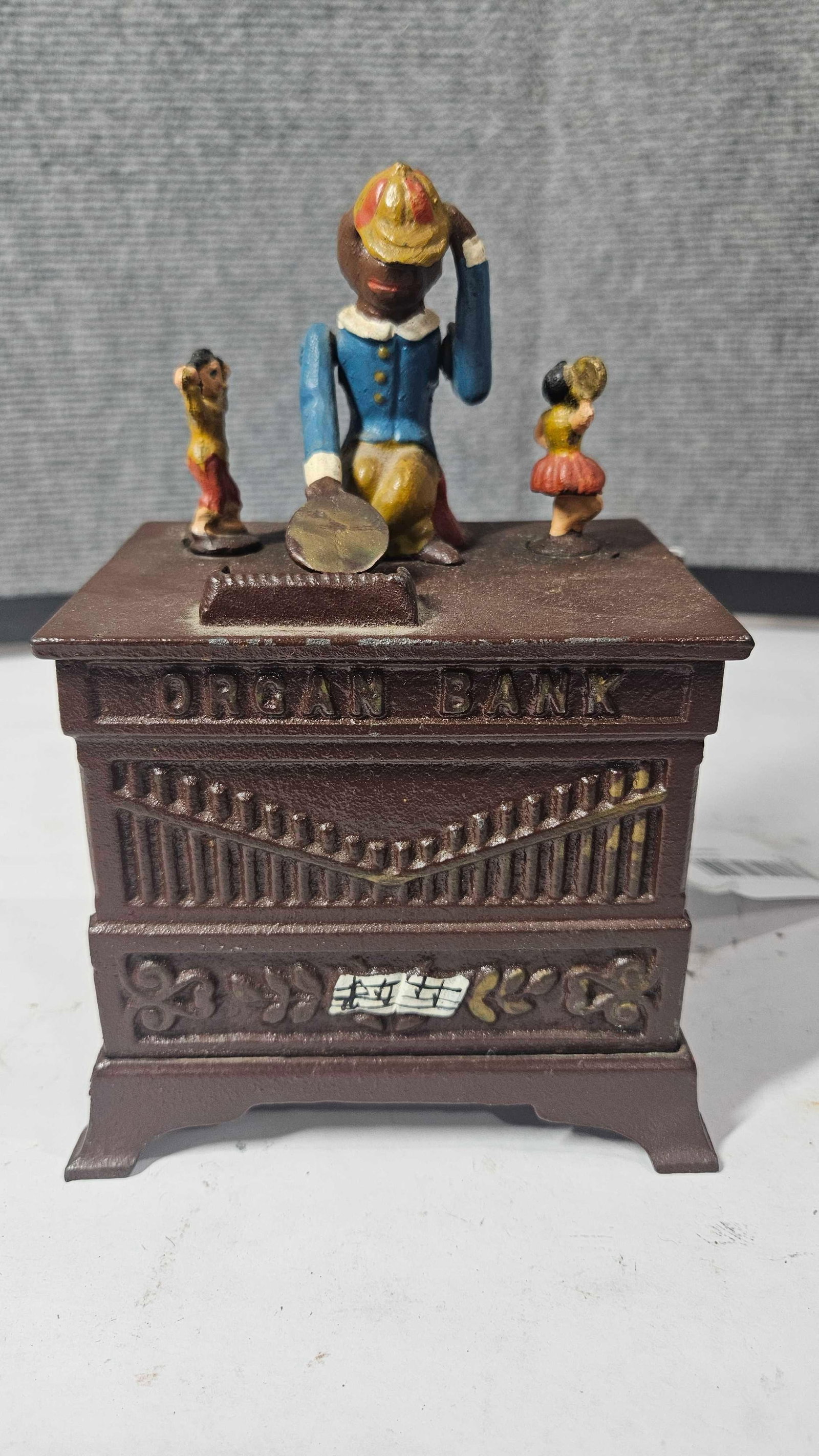 Cast Iron Organ Monkey Bank: From the book of knowledge series. This is a newer bank. 8x5x3.5. Works as it should