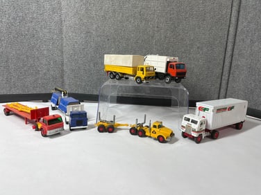 Semis, Garbage truck, and Covered Transport Trucks