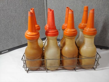 8 plastic Oil Bottles with carrier