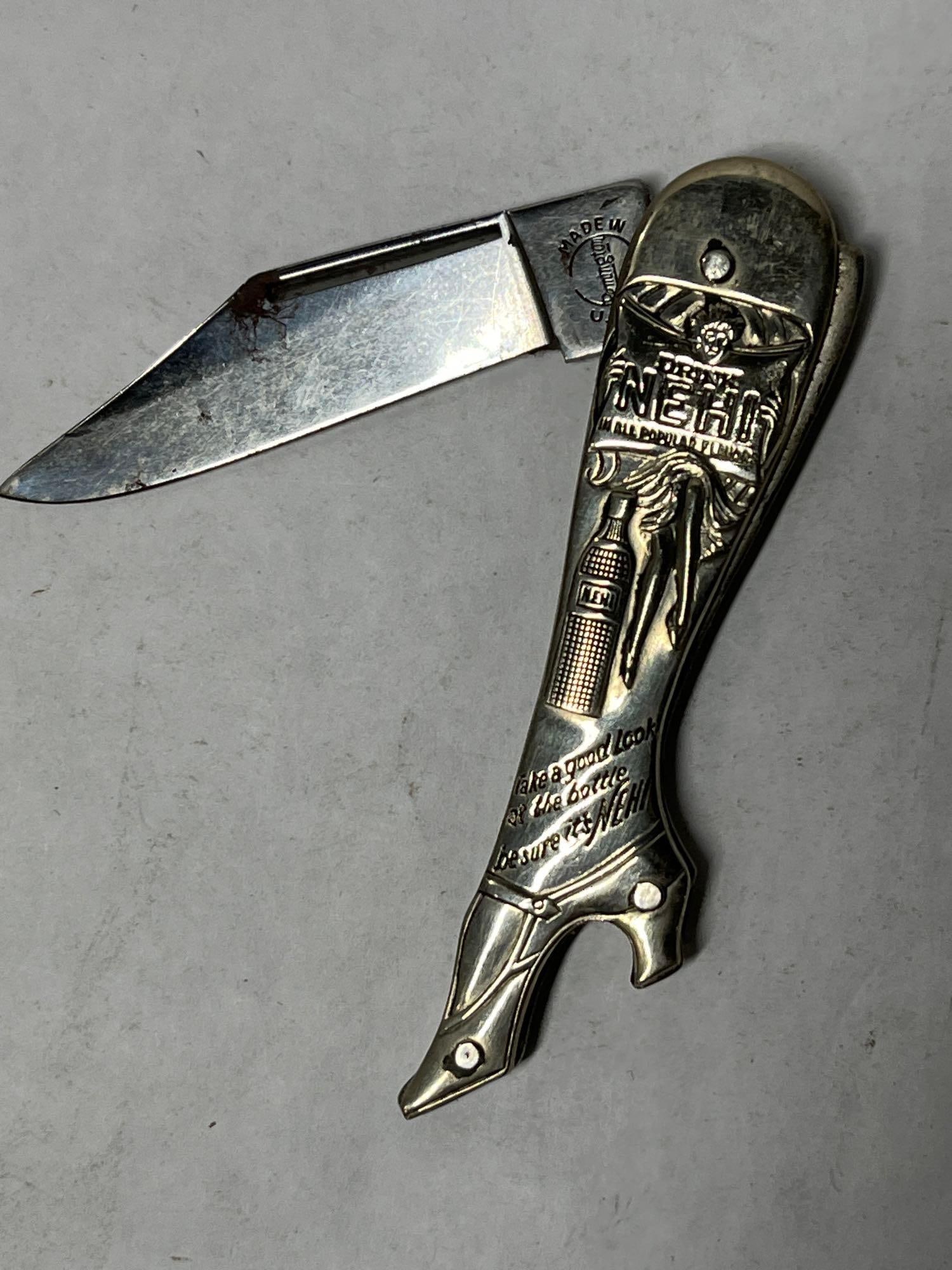Remington Nehi Advertising Boot Knife: 2 inch blade, some minor spotting to blade.