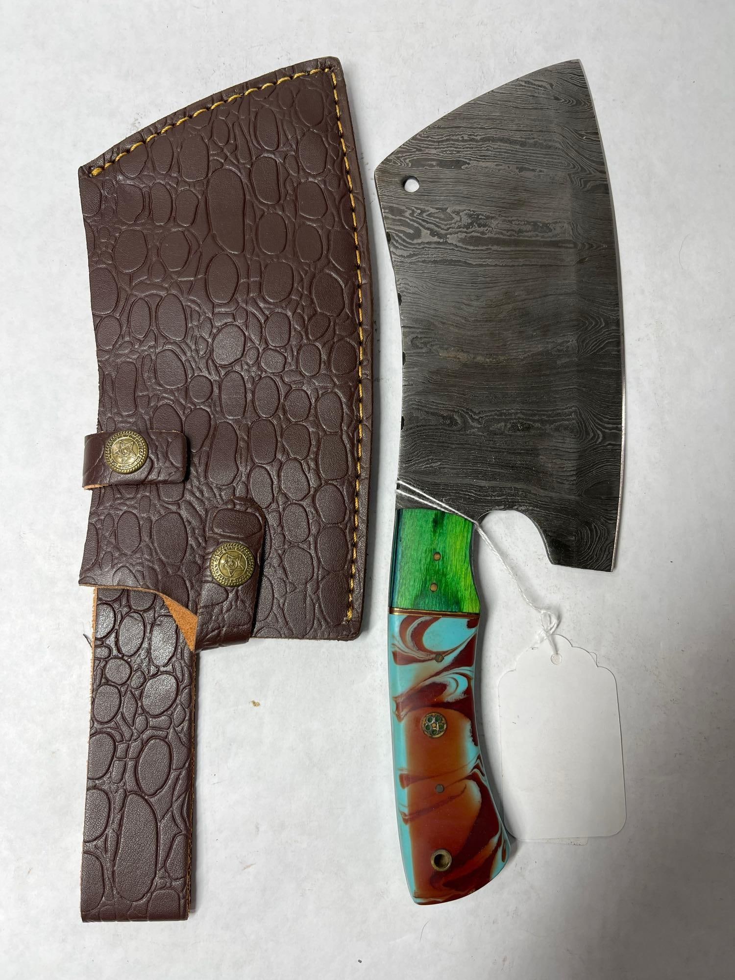 Damascus Blade Cleaver: Resin and wood handle and leather sheath. 12 inches long