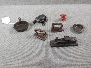 Griswold Pup, Mini cast iron sad irons and skillets, and frog