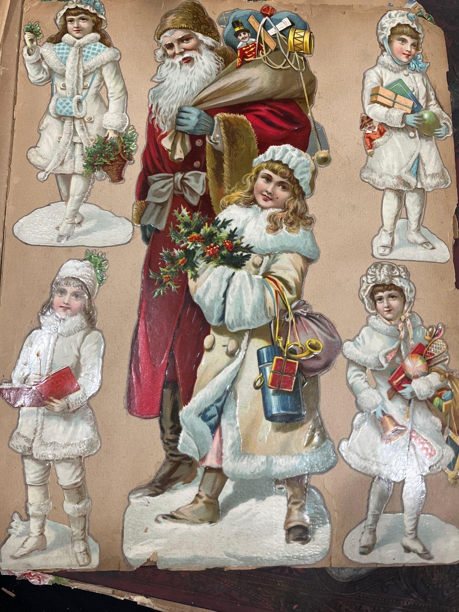 Paper cutouts, holiday, and mounted 1900 scrapbooks (1 of 10)