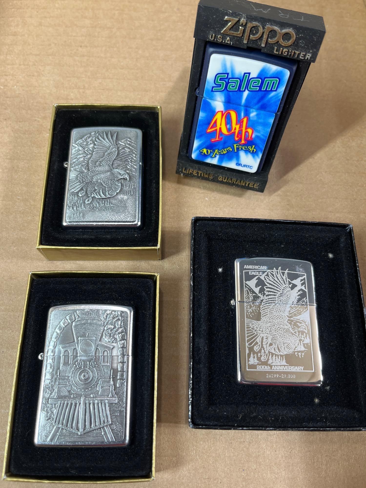 RR, Eagle and Advertising Zippo Lighters: All in original boxes.