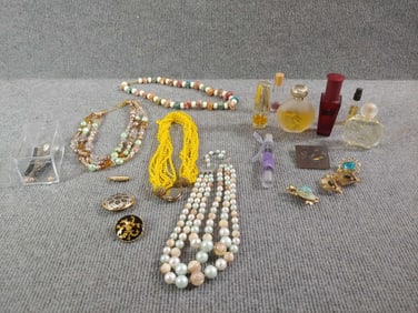 Pins, Perfumes, and Costume Jewelry
