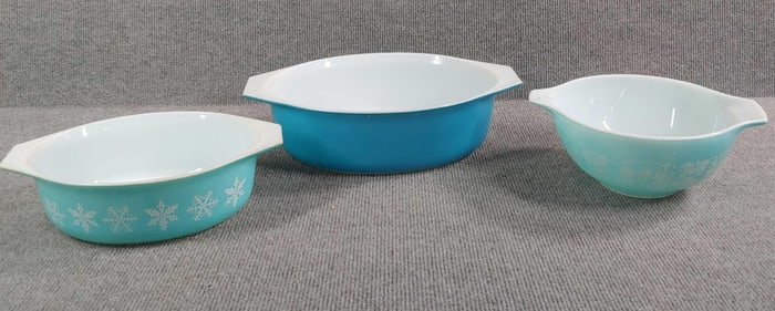 Teal Amish butter print and snowflake Pyrex Dishes