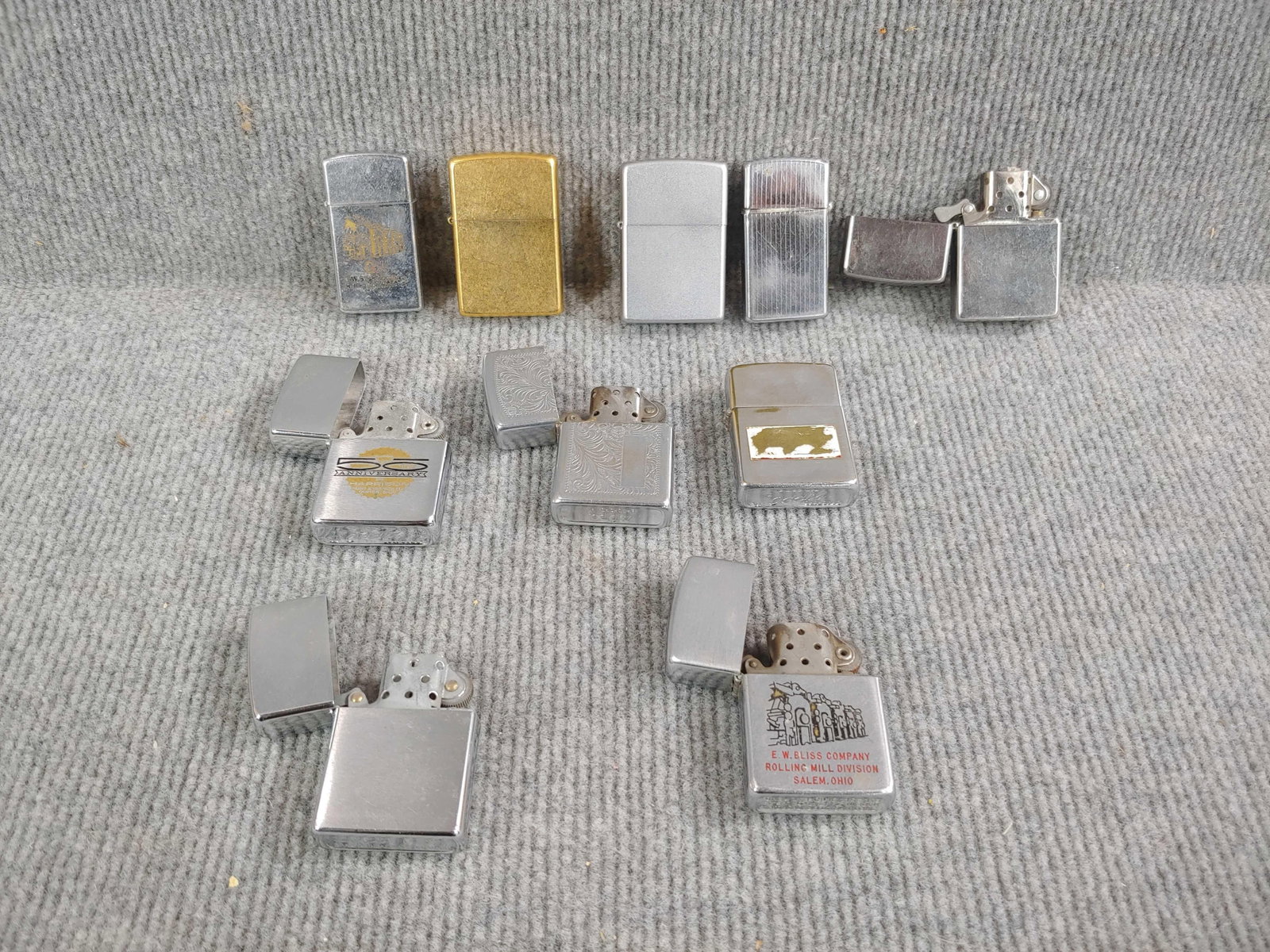 Zippo Lighters: Harrison Paint, EW Bliss Co, and etched. Some have spark.
