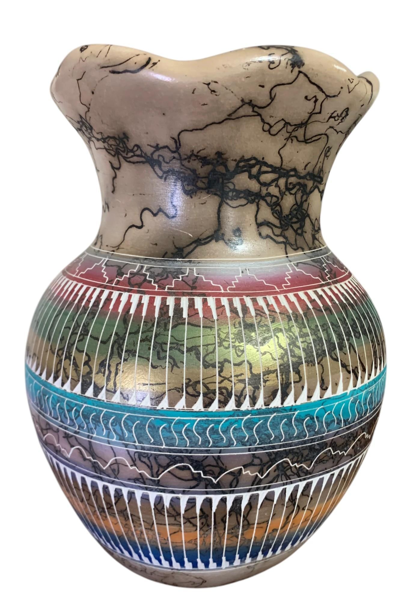Large Native American Navajo Artist Dina Willie Carved Horsehair Pottery Vase: 9" x 6 1/4" on a 4" base, 5 5/8" across the undulating edge mouth, structurally sound, signed on the base with a few areas of wear.