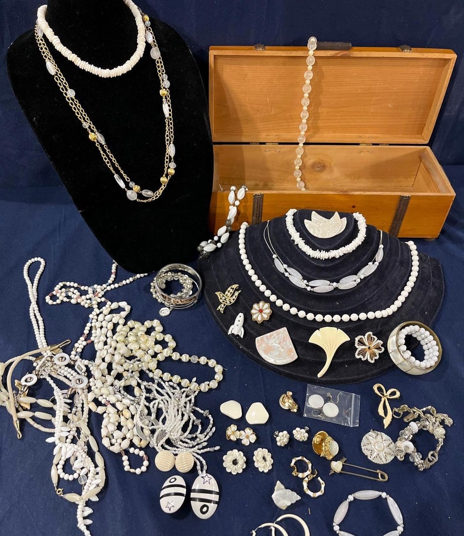 Mother of Pearl, Cream, and opalescent Costume Jewelry: 64 incredible pieces including necklaces, bracelets, brooches, earring and more. Shell jewelry, art glass and beads. Largs jewelry chest included.
