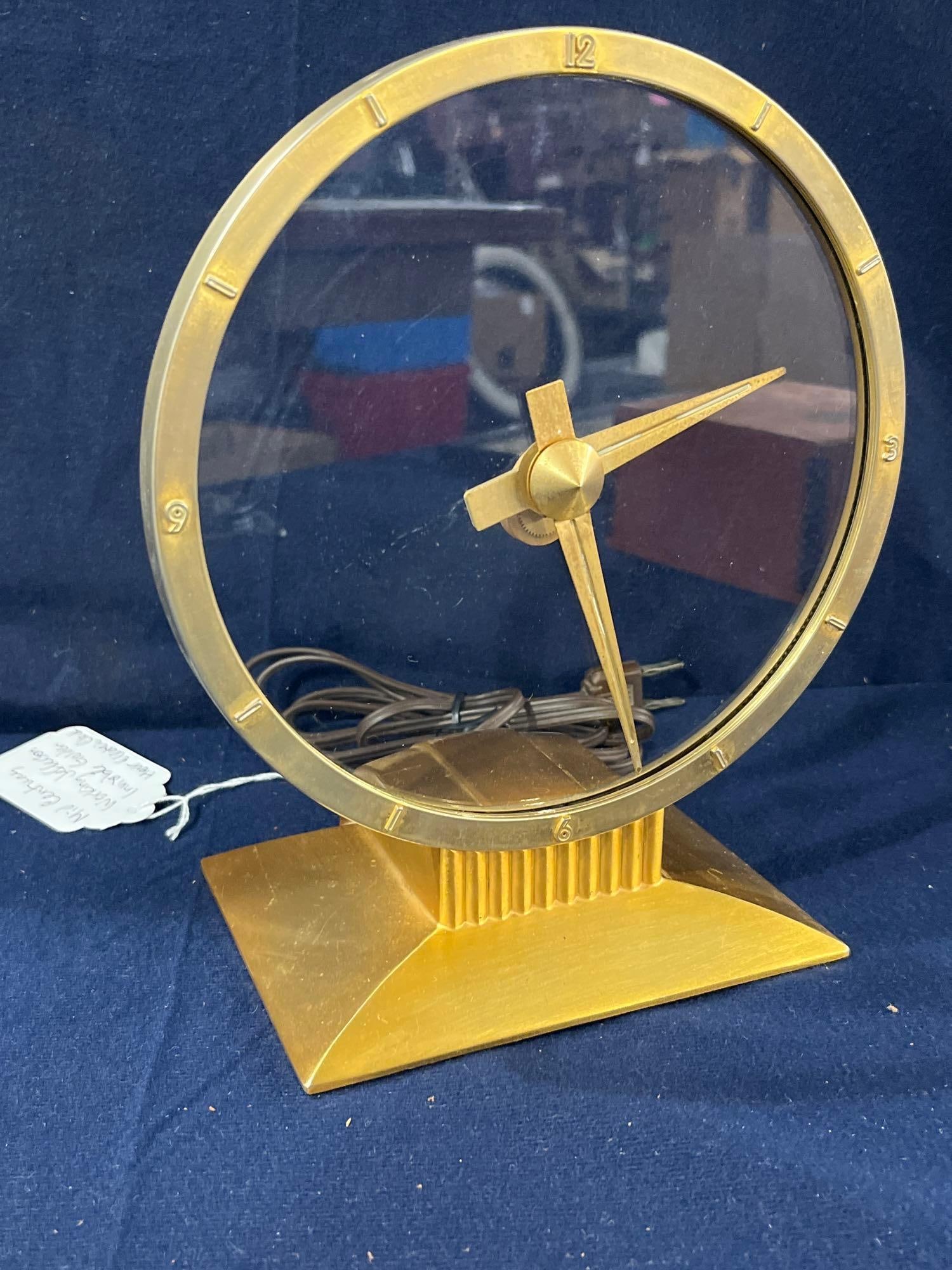 Mid Century Jefferson Invisible Golden Hour Clock: Working condition. 9 inches tall