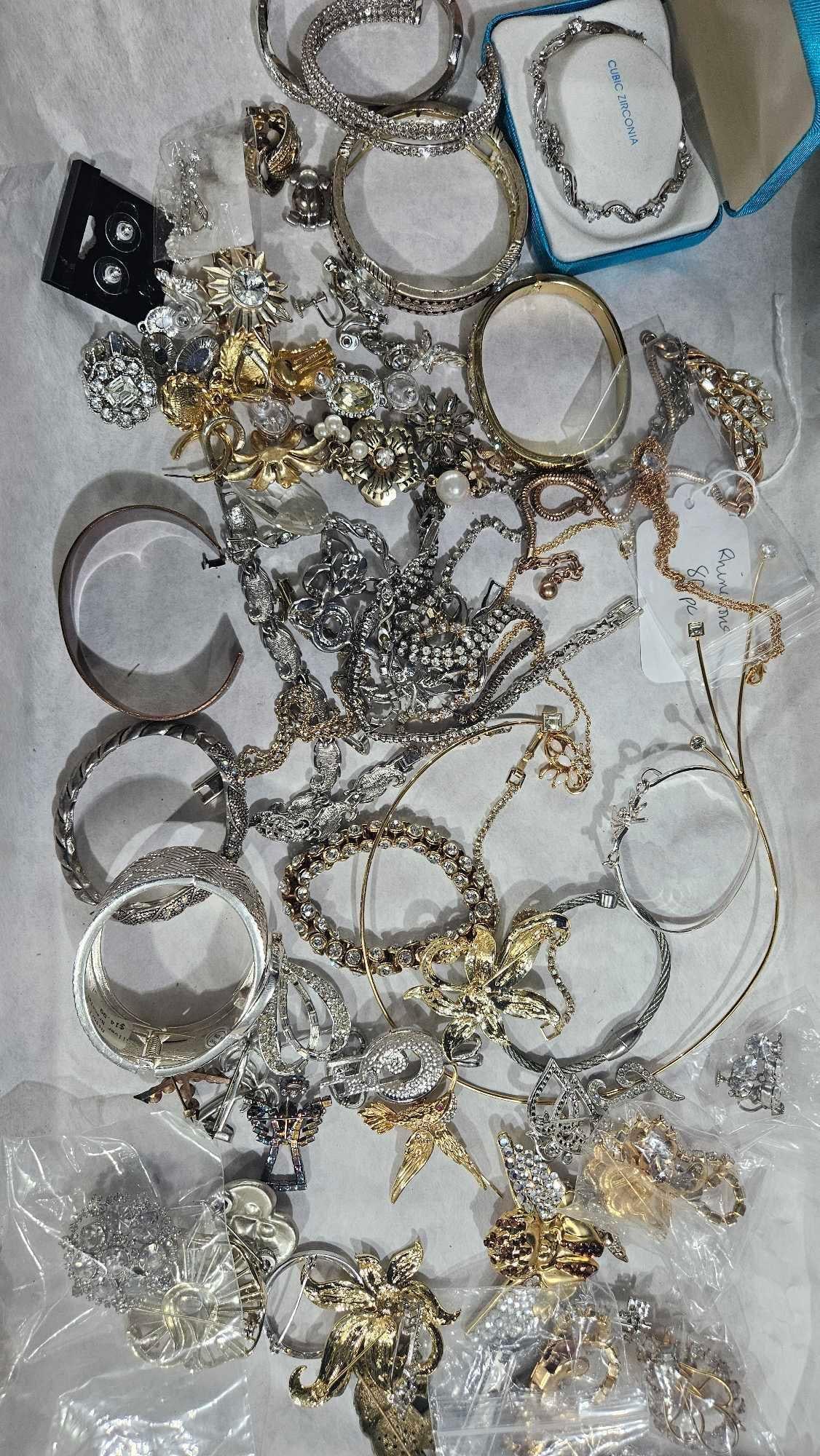 Rhinestone Jewelry: 80 necklaces, earrings, bracelets, and brooches.
