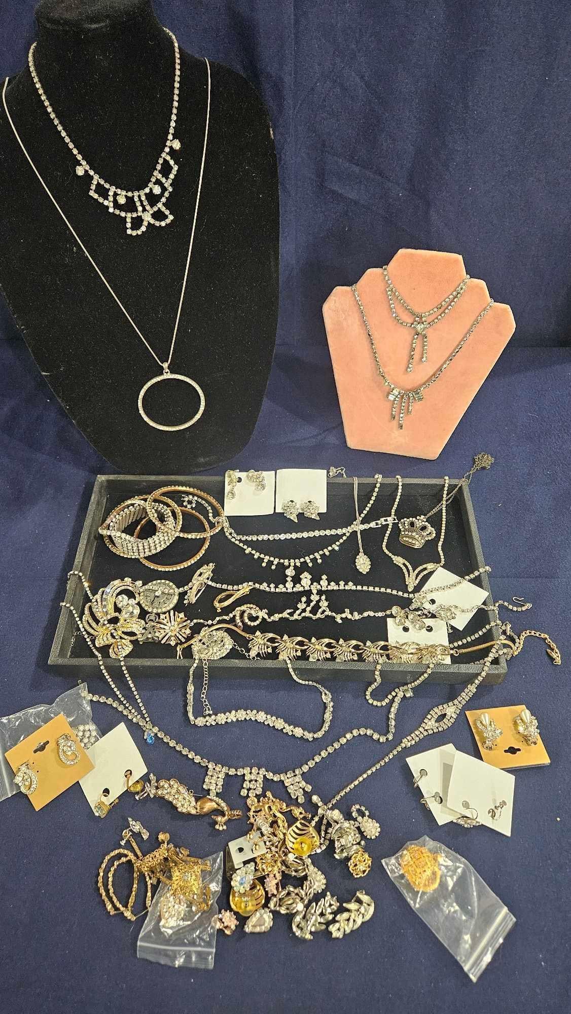 Great Rhinestone Jewelry Lot: 75 pieces including necklaces, earrings, brooches, bracelets, and more