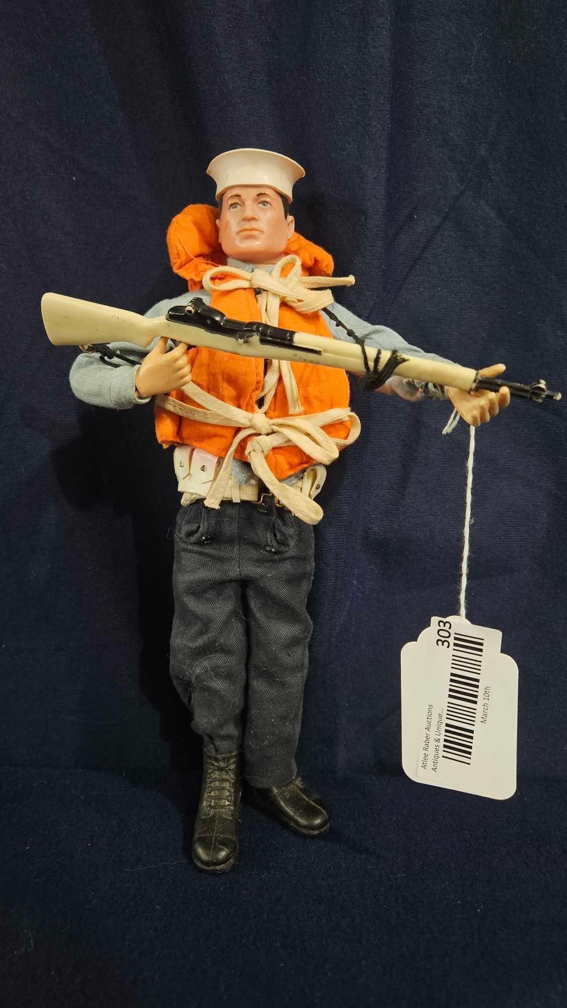 1964 GI Joe Sailor Action Figure: Sailor with life jacket and rifle. 12 inches tall.