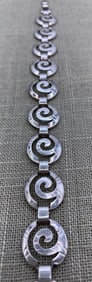 Shimmering Sterling Silver Embossed Spiral 9 Link Openwork Bracelet