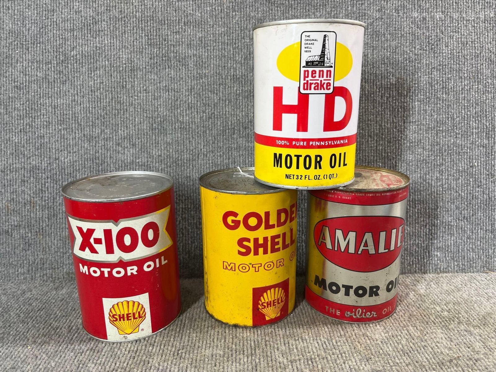 2- Shell, Amalie & Penn-Drake unopened 1qt cans: All are metal.