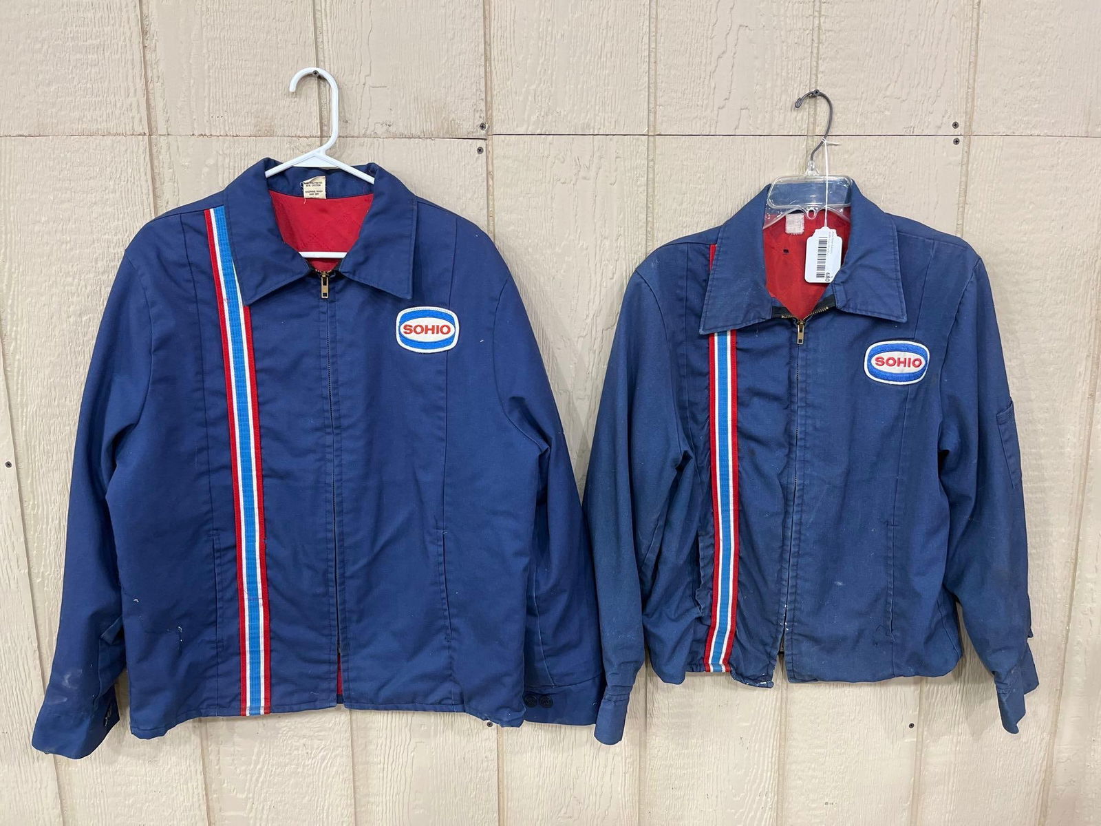 2- Sohio Service Station jackets: One shows wear with a few small holes, other is in great condition! Better condition is size medium 40/42, other markings are faded but appears similar in size.
