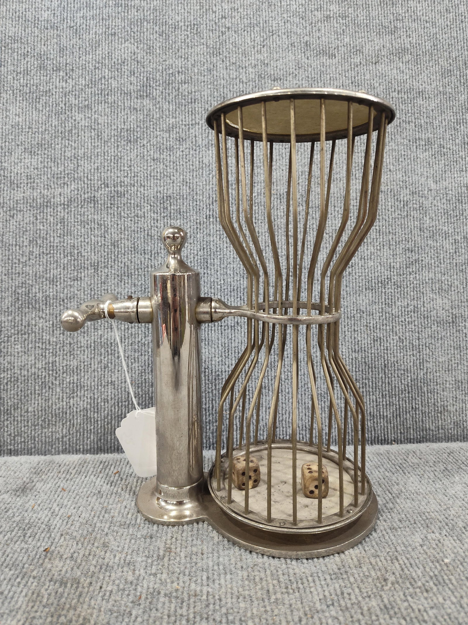 Casino Caged Dice Tumbler: Small crack to drum top but otherwise great condition. Turn handle to roll dice. 11 inches tall.