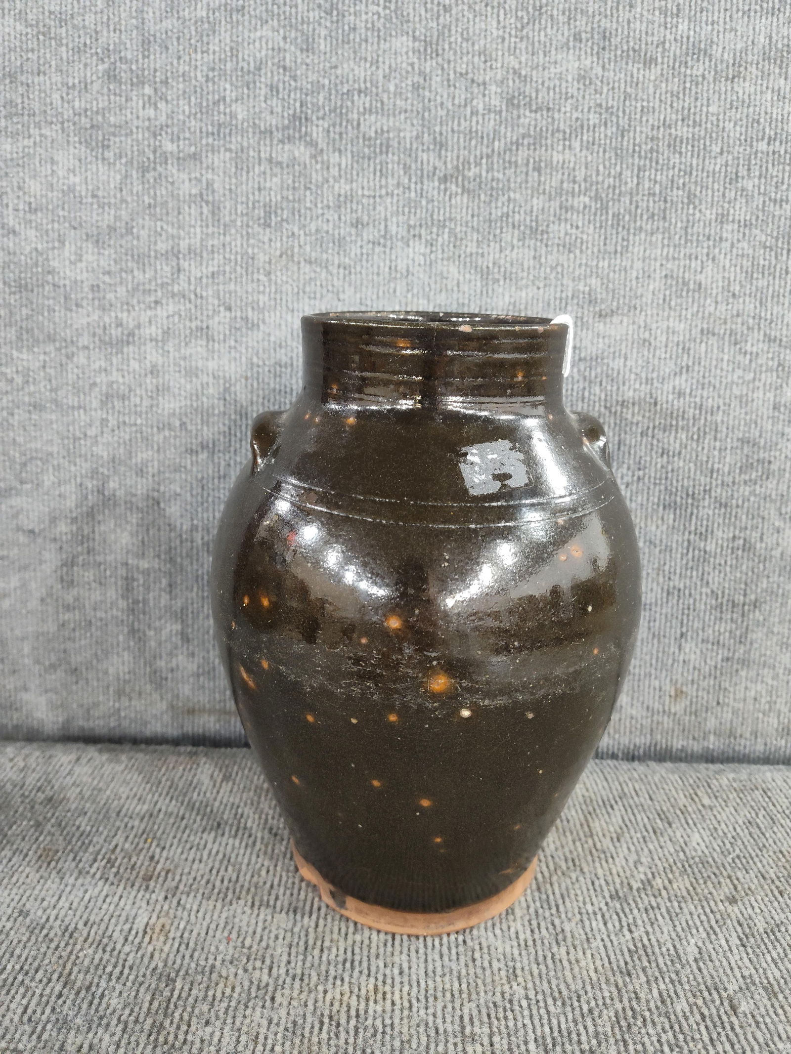 Two Handled Redware Crock: Several hairline cracks and chips from bottom. 10 inches tall