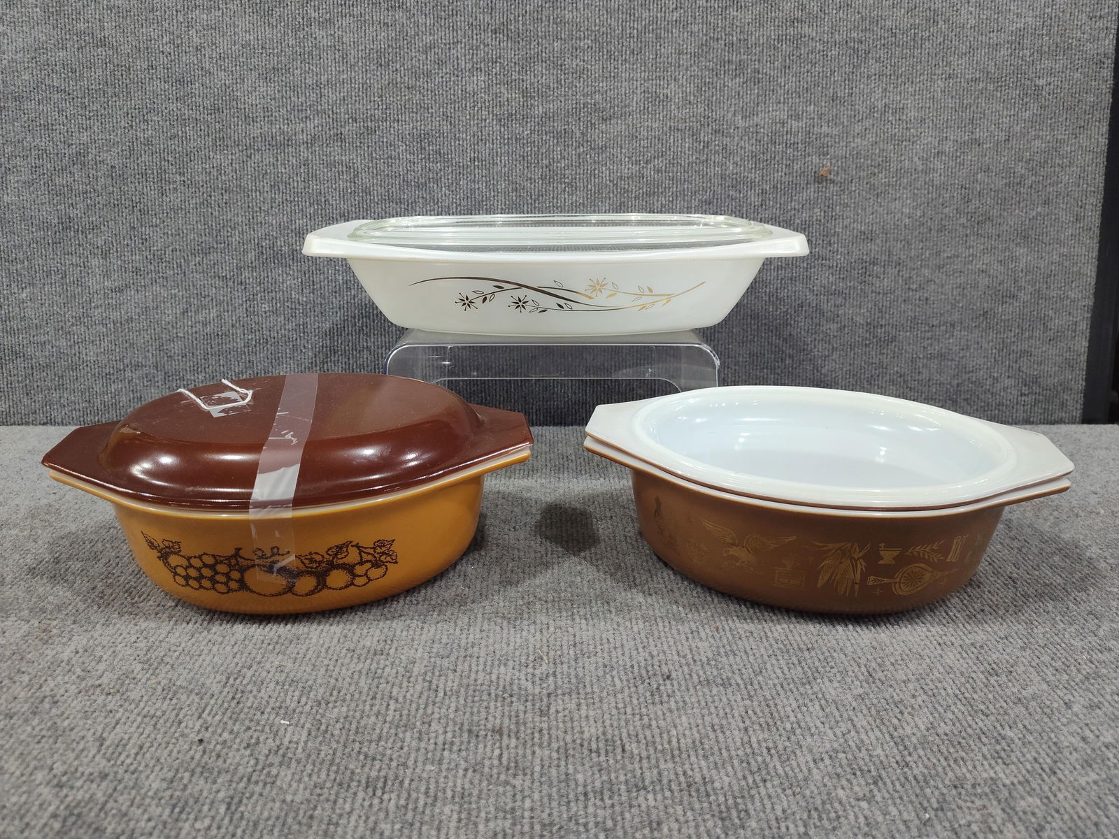 Golden Honeysuckle, Early American, and Old Orchard Pyrex Dishes: 3 glass covered dishes.