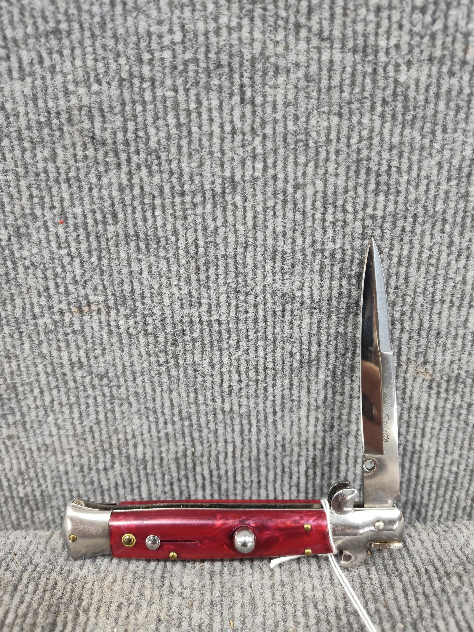 Stiletto Switchblade- Opalescent Red Handle (1 of 3)